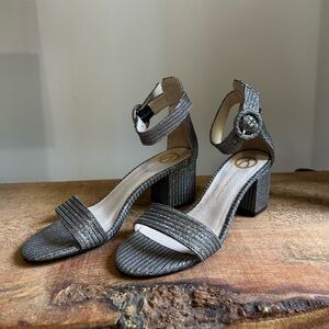 Silver block heels with ankle strap. Size 7.